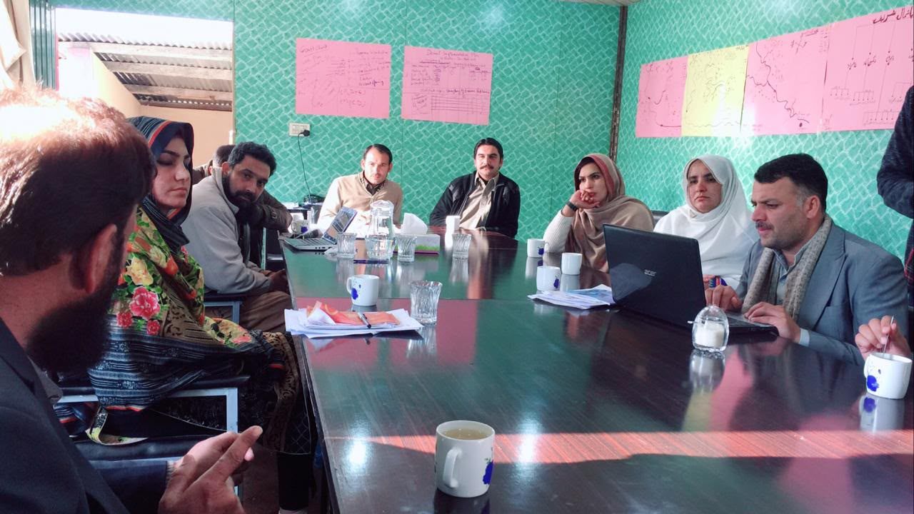 District stakeholder workshop with flipcharts during the Batagram baseline study