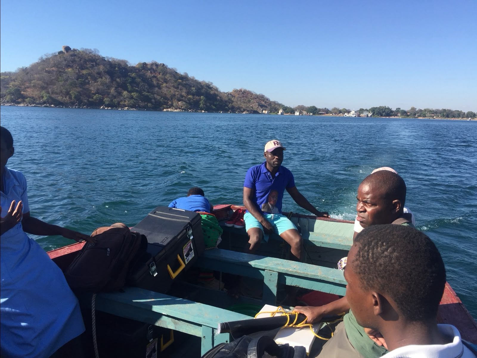 PMEye team and survey equipment in transit by boat across Lake Malawi